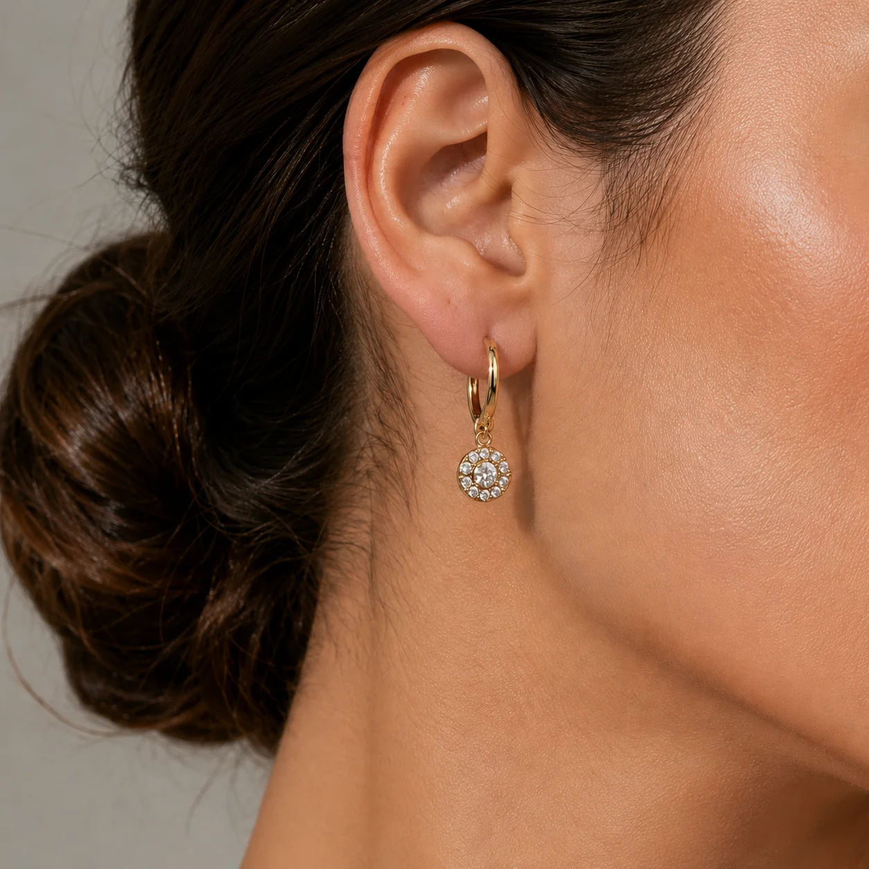 Bezel set diamond studs worn