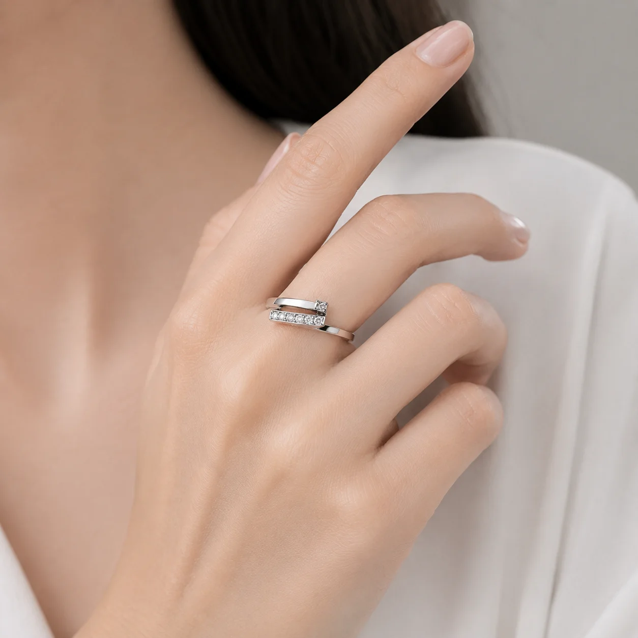 Model wearing a sculptural diamond ring
